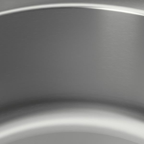 Stainless steel sink close-up. Smooth, reflective surface.