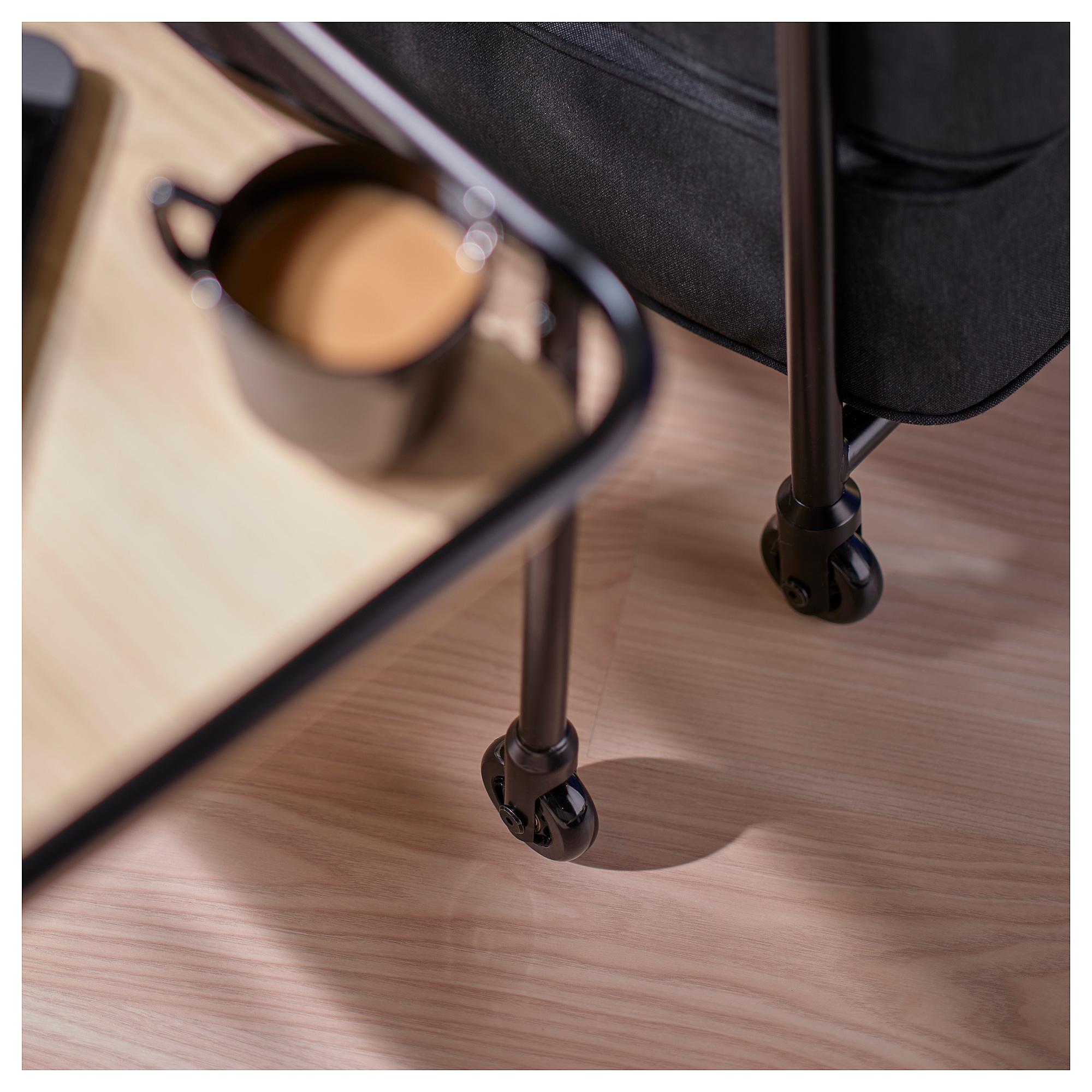 BRÄNNBOLL Side table on castors, light ash effect/black, 69x39 cm