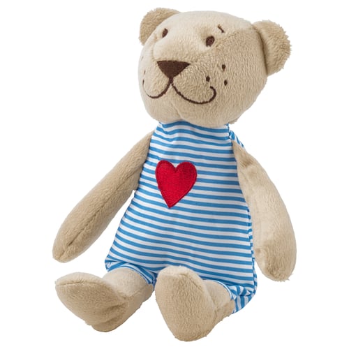 Faber bjorn: light brown bear in blue striped jumpsuit with red heart, soft plush material, sitting pose.
