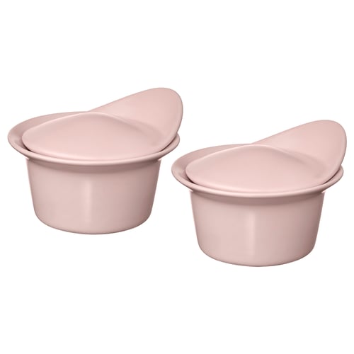 Two light pink ceramic bowls with covers, stackable, smooth edges, simple design.