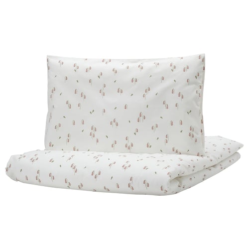 White GULDVÄVARE baby bedding with pink flowers, organic cotton duvet and pillowcase.