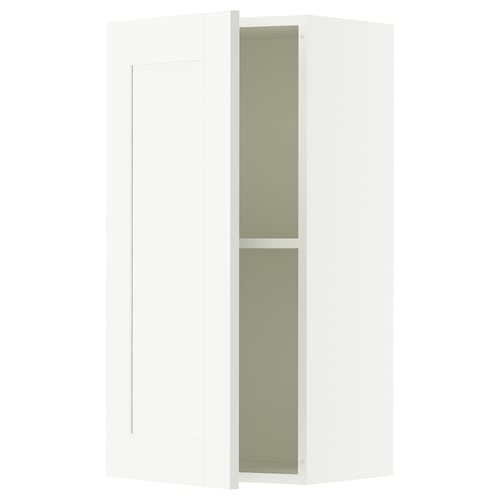 KNOXHULT white wall cabinet with open door showcasing interior shelves.