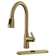 Golden kitchen tap with pull-down sprayer, sleek curved neck, metallic finish.