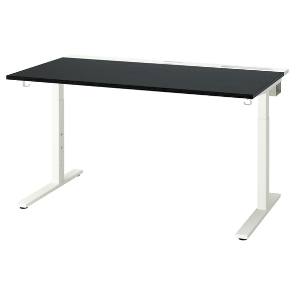 Adjustable desk, black top, white legs.