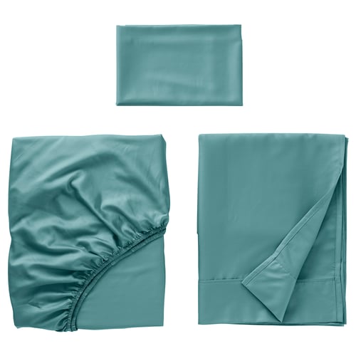 Three pieces of luxurious teal bedding: sheet, fitted sheet, pillowcase. Made from smooth cotton and lyocell blend, sateen-woven.