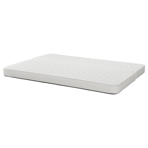 White rectangular sofa-bed mattress by IKEA, featuring a textured surface and firm support.