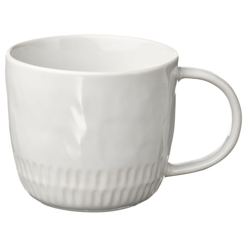A white pansarmug with a glossy finish and horizontal grooves near the base. It has a simple, elegant design with a large handle.