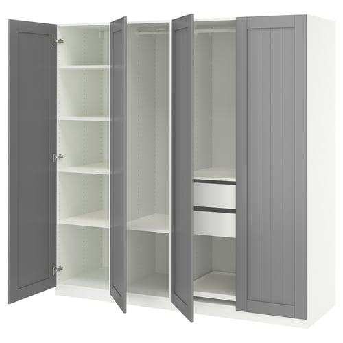 An open ikea PAX wardrobe in gray with multiple shelves inside.