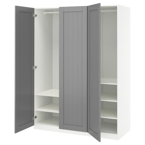 An open white and grey PAX wardrobe with shelves.