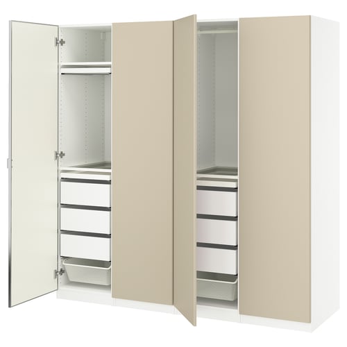 Beige PAX wardrobe, open showing shelves, drawers, mesh baskets.