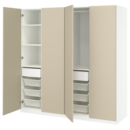 Open beige PAX wardrobe, showing shelves and white mesh baskets.