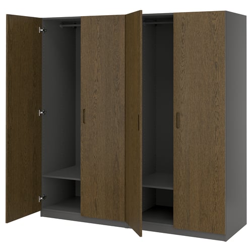 An open PAX wardrobe in brown with wooden doors and metal interior.