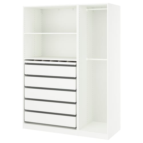 A white PAX wardrobe with shelves and drawers. Its a modern and functional design.