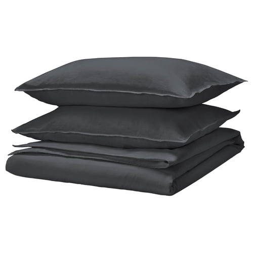 Stacked dark grey bed linens. Includes duvet cover and two pillowcases. Fabric is linen and cotton blend.