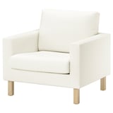 White fabric chair with wooden legs, simple modern design.