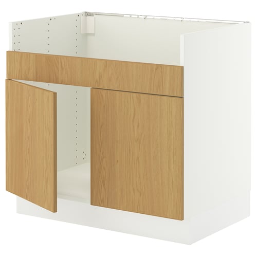 A white and light wood kitchen cabinet with a simple, modern design.