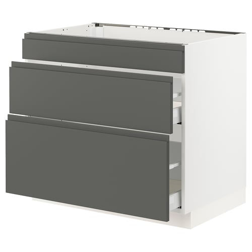 White ikea SEKTION cabinet with grey drawers, smooth and minimalist handles.