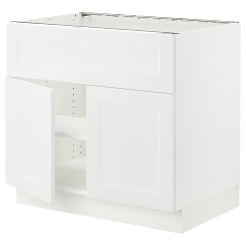 Displays a SEKTION kitchen unit in white with a modern design, featuring a large cabinet and a drawer.