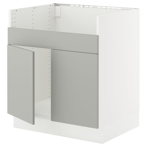 Modern white kitchen cabinet with grey doors and drawers. Sleek, flat-panel design featuring sturdy frame construction.