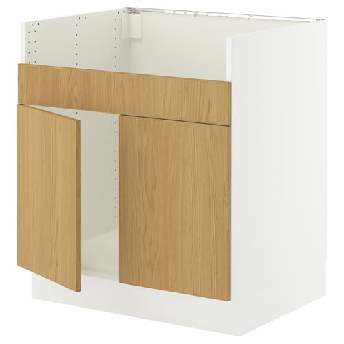This image shows an ikea SEKTION kitchen cabinet in white with light oak doors and drawers. It has a sleek, modern design.
