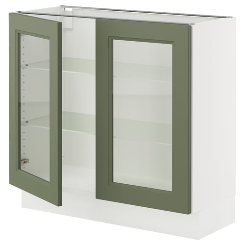 SEKTION kitchen unit with grey-green glass doors, white base, adjustable shelves.
