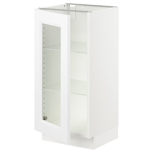 SEKTION kitchen cabinet in white, rectangular shape with clear glass shelves. Modern and minimalist design, adjustable shelves.