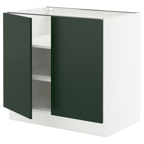 White SEKTION cabinet with green doors, adjustable shelves, flat design.