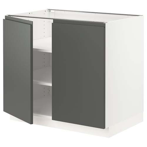 Modern grey ikea SEKTION kitchen cabinet with integrated handles and a white interior.