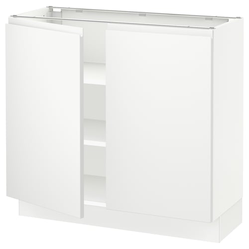 Modern white kitchen cabinet with sleek design and minimalist handles, featuring adjustable shelves.