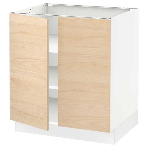 A modern kitchen cabinet from IKEAs SEKTION line in white and light wooden finish with adjustable shelves.