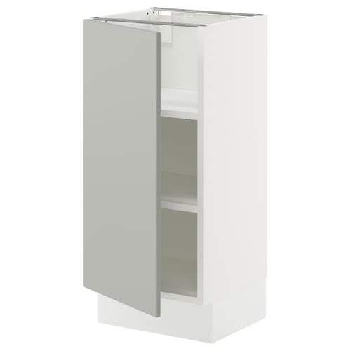 Modern light grey SEKTION kitchen cabinet with adjustable shelves, white details, and a three-dimensional square shape.