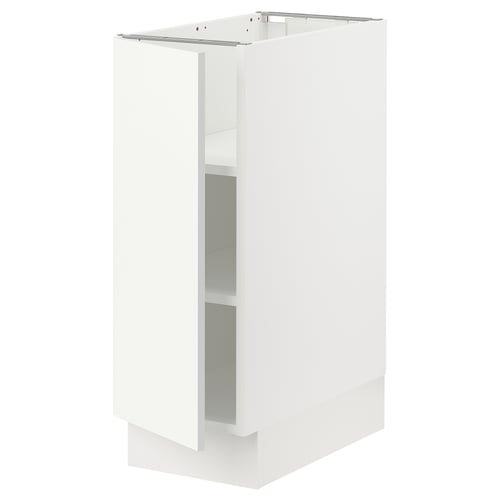 A white ikea SEKTION kitchen cabinet with a single door and adjustable shelves.