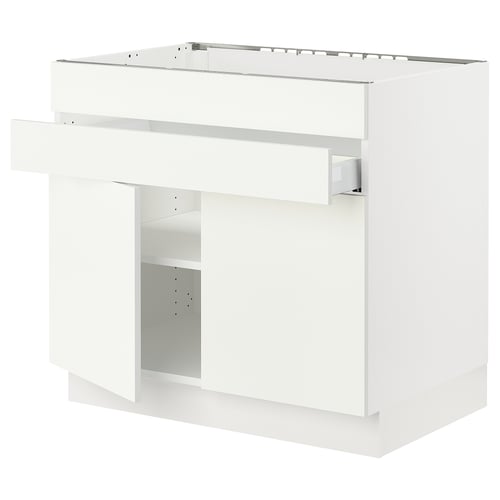 White SEKTION kitchen cabinet, modern design with adjustable shelves and damper hinges.
