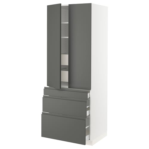 Displays a modern, tall kitchen cabinet in white with dark grey drawers and doors. It has an adjustable shelf inside and integrated handles.