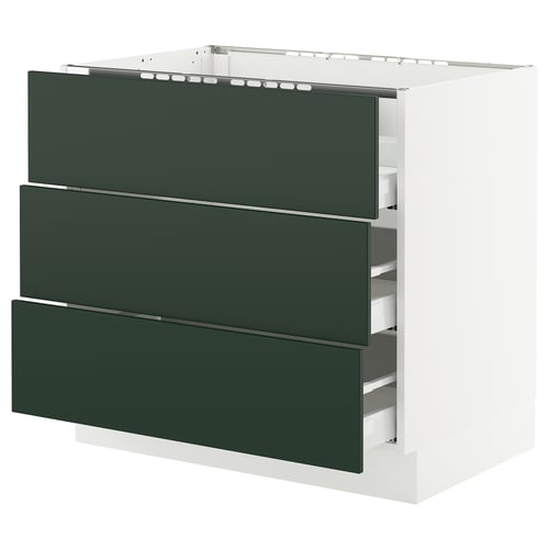 A modern kitchen cabinet named SEKTION with three green drawers, a white base, and sleek design.