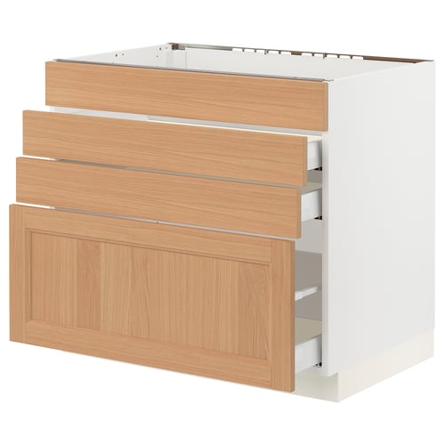 SEKTION kitchen unit with oak drawers and white base.