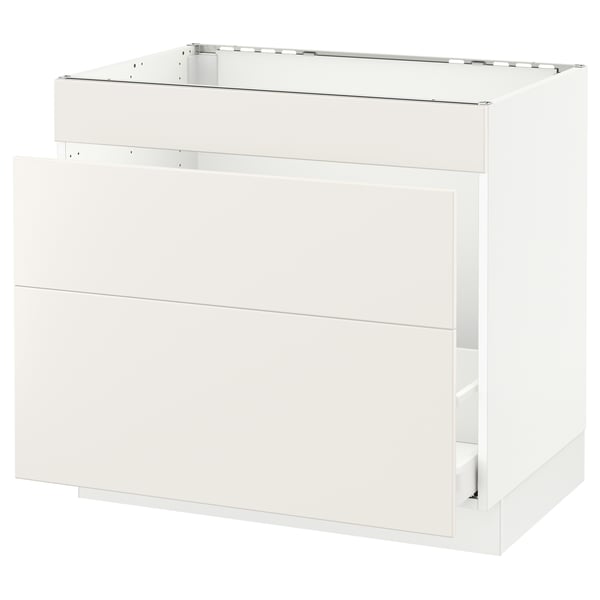 White modern kitchen cabinet, sleek design, smooth surfaces, SEKTION model.