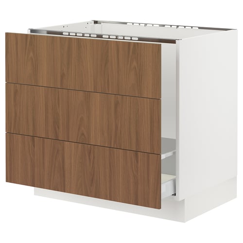 Modern white kitchen cabinet with 3 walnut drawers.