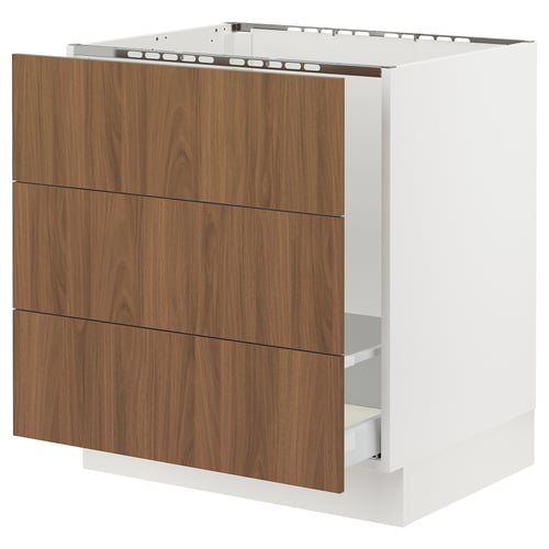 Modern white kitchen unit with walnut brown drawers, smooth surface, three drawers.