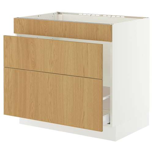 A SEKTION white kitchen cabinet with light wood drawers. It a modern design with a sturdy frame.