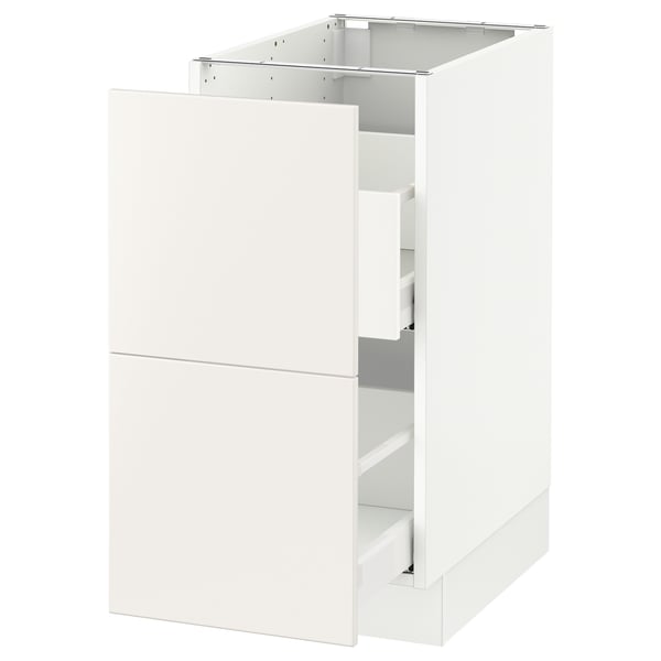 A white modern kitchen cabinet from IKEAs SEKTION series, featuring a smooth drawer.