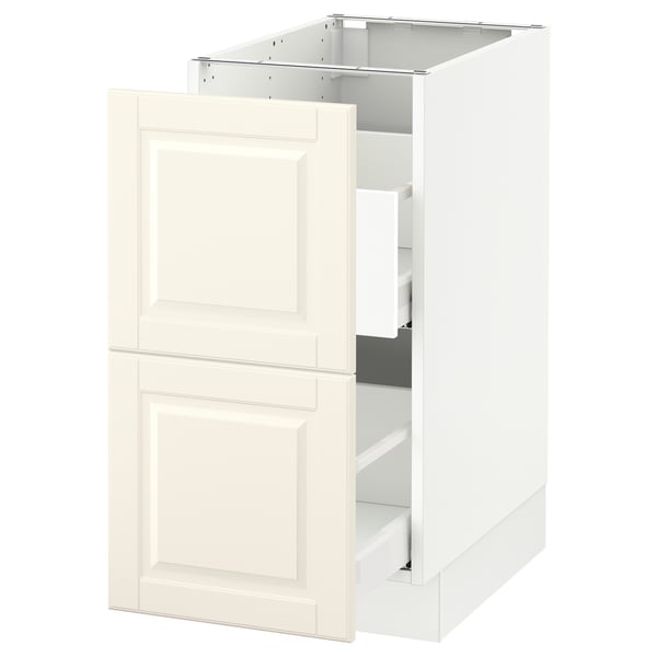 SEKTION kitchen cabinet in off-white with panel design and bevelled edges.