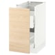 An ikea SEKTION kitchen cabinet with an askersund light ash wood pattern drawer and a white base.