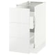A white SEKTION kitchen cabinet with a glossy finish and one open drawer.
