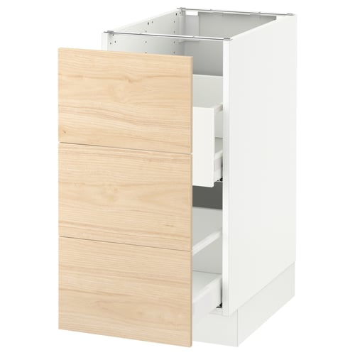 White and wood SEKTION kitchen cabinet with open drawer.