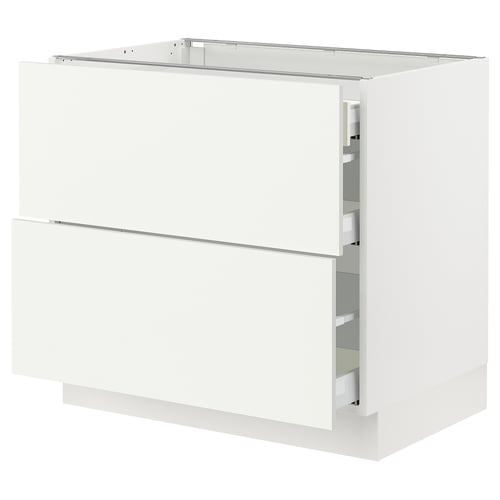 Displays an ikea SEKTION kitchen cabinet in white with drawers and a top shelf. The cabinet is rectangular with clean lines and a modern design.