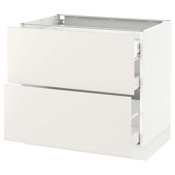White SEKTION kitchen cabinet with veddinge smooth fronts. Square shape, glossy finish. Modern design.