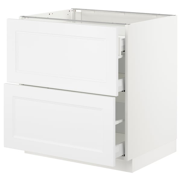 Ikea SEKTION white kitchen cabinet with two drawers and shelves.