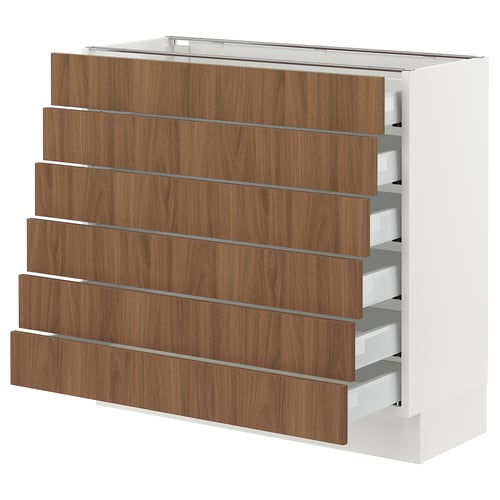 A modern white SEKTION kitchen cabinet with six walnut-colored drawers. It has a sleek design with smooth surfaces.