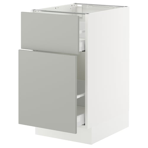 White SEKTION kitchen cabinet with grey drawers and doors.